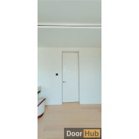 White Glossy Finish Travertini Concealed Doors UAE for Modern Interiors